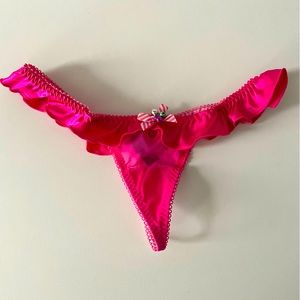 Victoria’s Secret pink thong with bells size S. NWT